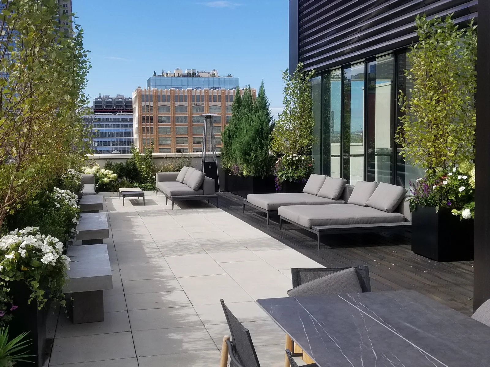 Private terrace with planters and finished outdoor greenery